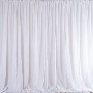 Delicate white sheer draping for elegant wedding and event decoration backdrops