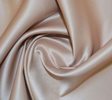 Elegant beige bridal satin draping for sophisticated wedding and event decor backdrops